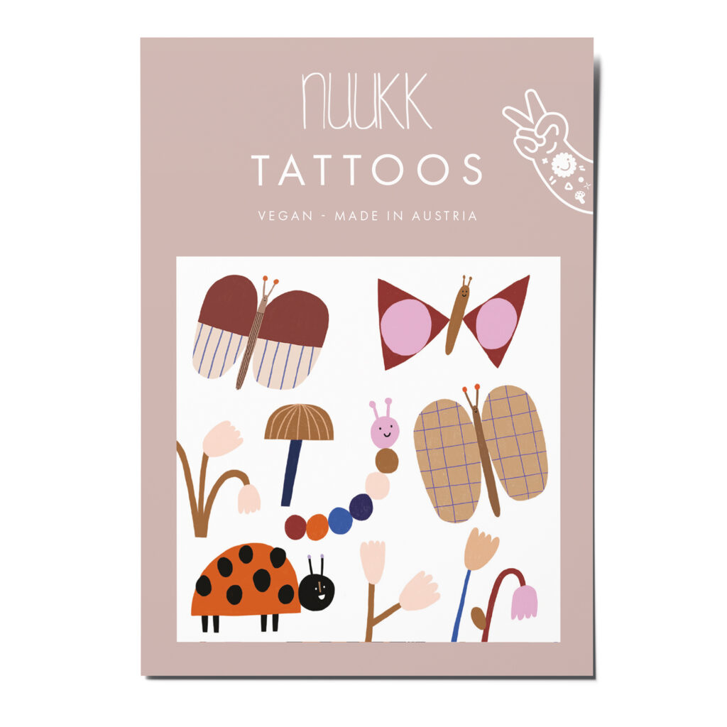nuukk nachhaltige Kindertattoos “ Marienkäfer”: mit Illustrationen von Anna Katharina Jansen. Frühlingshafte Motive, wie Raupe, Schmetterling, Tulpe. Perfekt für's Osternest, oder zum Ostereier-Verzieren.
